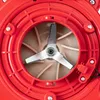 Close-up view of the internal mechanism of a red leaf blower, showing the blades and fan. Produktbild-Vorschau