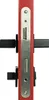A close-up, straight-on view of a door lock mechanism mounted on a red door edge. Produktbild-Vorschau