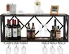 A wine rack with bottles, glasses, and decorative items on a shelf. Náhľad obrázku produktu