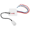A white motion sensor with multiple colored wires and a small white sensor attached to a black cable. Produktbild-Vorschau