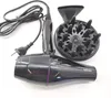 A black Philips hair dryer with its accessories laid out on a white background. Náhled obrázku produktu