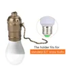 A lamp holder with a light bulb and a close-up of an E27 screw bulb. Náhled obrázku produktu