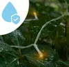 String lights are shown on wet green leaves in the rain, with a water droplet icon in the upper left corner. Náhľad obrázku produktu