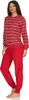 A woman is standing and modeling a red and white striped pajama set. Produktbild-Vorschau