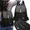 A collage of images showing a black leather backpack from different angles, with a partial view of a person wearing it. Voir les images du produit