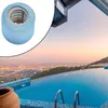 A close-up of a pool filter with a swimming pool and a scenic view in the background. Produktbild-Vorschau