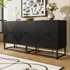 A black sideboard with a geometric pattern on its doors, placed in a room with a rug and artwork on the wall. Voir les images du produit