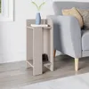 A modern bedside table next to a sofa in a living room. Podgląd zdjęcia produktu