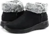 A pair of black Skechers boots with gray faux fur trim. Voir les images du produit
