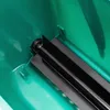 Close-up view inside a green container with a black plastic channel. Podgląd zdjęcia produktu