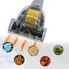 A vacuum cleaner brush head is shown close-up, with arrows indicating air flow and small circular insets displaying microscopic organisms. Voir les images du produit