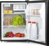 An open mini-fridge with various food items inside. Voir les images du produit