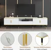 A modern TV stand with a marble-look top, gold accents, and black legs, displayed in a living room setting with a TV on top. Close-up details of the marble texture, drawer handles, and legs are shown below. Podgląd zdjęcia produktu