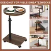 A collage of images showing a mobile C-table used in different settings: next to a sofa, a bed, and a bathtub. Produktbild-Vorschau
