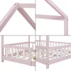 A collage of four close-up images showing details of a pink and white wooden house-shaped children's bed frame. Náhľad obrázku produktu