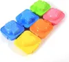 A set of colorful plastic molds shaped like animals and hearts, designed for making decorative food items. Produktbild-Vorschau