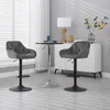 Two dark gray bar stools are placed around a small round table in a room with blinds and a white cabinet. Náhľad obrázku produktu