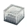 A single ice cube-shaped solar light with a textured surface and a dark base, isolated on a white background. Produktbild-Vorschau