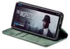 A smartphone in a green flip case is displayed on a white background. The phone screen shows a movie poster for 'The Inspector'. Produktbild-Vorschau