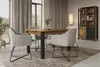 A dining room set with a table and chairs, and a display cabinet in the background. Anteprima dell’immagine prodotto