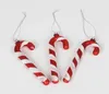 Three red and white striped candy cane ornaments are displayed against a white background. Produktbild-Vorschau