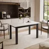 A dining table set in a modern kitchen or dining area. Produktbild-Vorschau