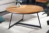 A round coffee table with a wooden top and black metal legs, placed on a rug in a living room setting. Produktbild-Vorschau