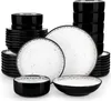 A collection of black and white speckled ceramic plates and bowls stacked and arranged on a white background. Náhled obrázku produktu