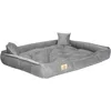 A gray dog bed with tufted cushioning and two small pillows. Náhled obrázku produktu