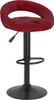 A single red velvet bar stool with a black base and stem, shown from the front on a white background. Náhled obrázku produktu