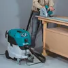 A person is using a circular saw connected to a vacuum cleaner to cut a piece of wood on a workbench. Podgląd zdjęcia produktu