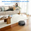 A woman is relaxing on a couch with her dog, while a robot vacuum cleaner is operating on the floor. Produktbild-Vorschau