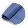 A rolled-up blue swaddle blanket is shown in a close-up shot. Náhľad obrázku produktu