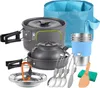 A collection of camping cookware and accessories laid out on a white background. Produktbild-Vorschau