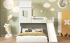 A child's bedroom with a bunk bed, slide, and themed decor. Náhled obrázku produktu