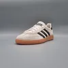 A single Adidas sneaker is shown against a plain gray background. Voir les images du produit
