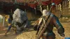 A scene from a video game showing two characters fighting a large monster in an arena. Podgląd zdjęcia produktu
