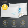 Two white pillows are shown on a dark gray background, with various marketing icons and text overlays highlighting product features. Produktbild-Vorschau