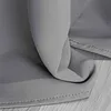 A close-up view of gray fabric, likely a curtain, showing its texture and stitching. Produktbild-Vorschau