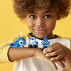 A young boy is holding three small LEGO creations on his arm against a yellow background. Náhľad obrázku produktu