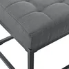 Close-up of a gray upholstered bench with a metal frame. Anteprima dell’immagine prodotto