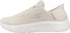 A side view of a beige Skechers sneaker. Náhľad obrázku produktu