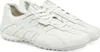 A pair of white leather sneakers. Produktbild-Vorschau