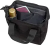 A black tote bag with its interior visible, showing a passport and a gold-colored bottle. Produktbild-Vorschau