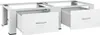 A white metal underframe for a washing machine and dryer with two open drawers. Produktbild-Vorschau
