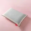 A pillow on a pink background. Produktbild-Vorschau