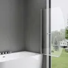 A modern bathroom with a white bathtub and a clear glass shower screen, with a view of a backyard through the window. Produktbild-Vorschau