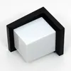 A black and white modern outdoor wall lamp with a sensor. Produktbild-Vorschau