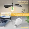 A rechargeable LED light bulb is shown connected to a laptop via USB, with text overlays highlighting its features and charging methods. Produktbild-Vorschau