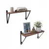 Two wall shelves are displayed against a white background. The top shelf holds books and a decorative jar. The bottom shelf displays a framed picture, a decorative pineapple, and a potted plant. Produktbild-Vorschau